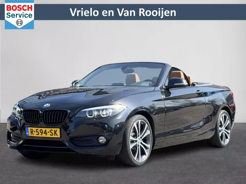 BMW 2-serie Cabrio 220i High Executive | Automaat | Airco | Cruise | Lederenstuurwiel | LM velgen | Navi | Voorstoelen verwarmd | ( Vestiging - Nieuwegein )