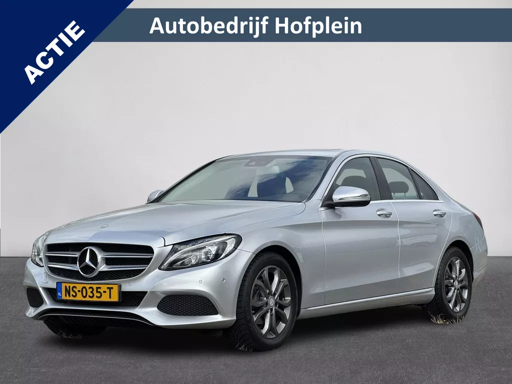 Mercedes-Benz C-klasse C180 Prestige Automaat Navigatie | LED Verlichting | Dode Hoek Detectie | Panorama schuif/Kanteldak, Elektrisch | Stoelverwarming | PDC | Automatische Airco | 17&quot;Lmv | Halfleer | Sportstoelen | INCLUSIEF EXTRA ORIGINELE SET LICHTMETALEN VELGEN (vestiging Vianen)